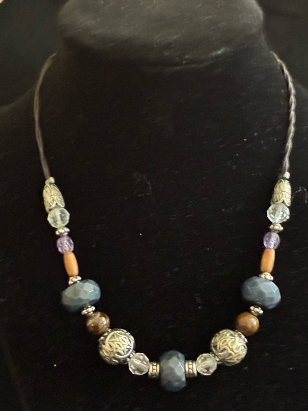 Lia Sophia EUC Necklace Blue
Sodalite Stone Wood Bead
Leather Cord Silver Tone - Picture 2 of 12